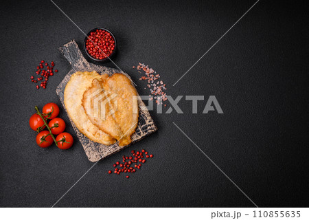 Delicious battered chicken breast chops with salt, spices and herbs Delicious battered chicken breast chops with salt, spices and herbs 110855635