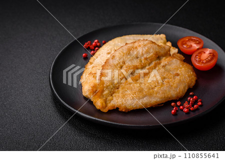 Delicious battered chicken breast chops with salt, spices and herbs Delicious battered chicken breast chops with salt, spices and herbs 110855641