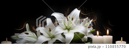 White lilies and burning candles White lilies and burning candles 110855770