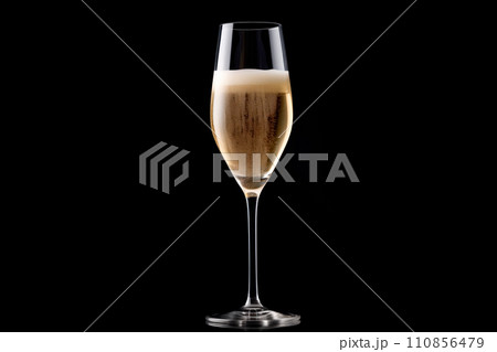 A crystal-clear flute glass of champagne isolated on black background A crystal-clear flute glass of champagne isolated on black background 110856479
