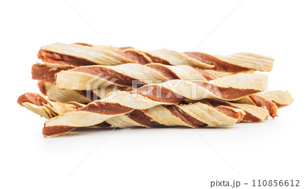 Dog food. Snack sticks for dogs isolated on white background. Dog food. Snack sticks for dogs isolated on white background. 110856612
