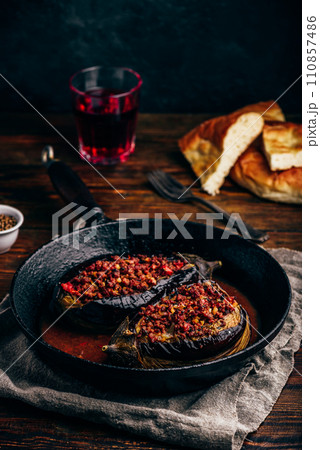 Eggplants stuffed with ground beef and tomatoes Eggplants stuffed with ground beef and tomatoes 110857486