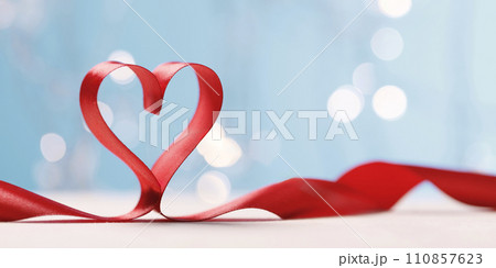 Hearts made from red ribbon. Valentine's card 110857623
