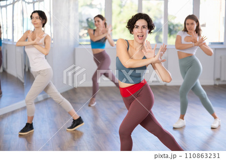 Group of women dancing modern dance in studio 110863231