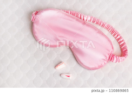 Silk sleep mask, earplugs, orthopedic pillow. All conditions for good deep sleep. close up 110869865