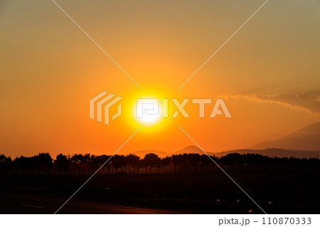 Beautiful african sunset over savannah in Tanzania 110870333