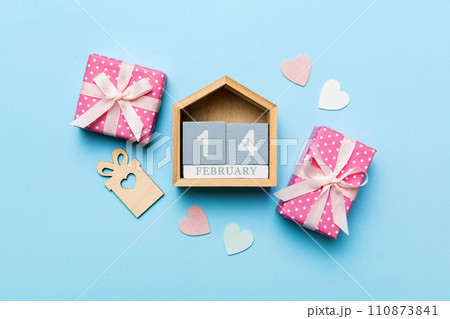 Valentine Day theme with wooden block calendar. Greeting card template for Valentines Day copy space for text 110873841