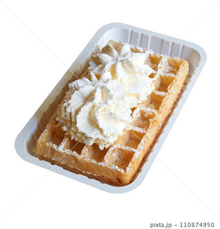 Tasty belgian waffle in packaging isolated on white background Tasty belgian waffle in packaging isolated on white background 110874950