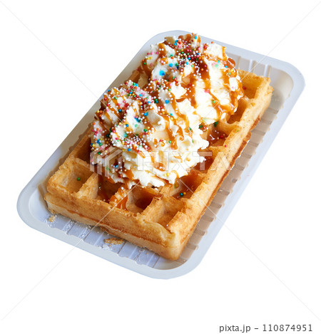 Tasty belgian waffle in packaging isolated on white background Tasty belgian waffle in packaging isolated on white background 110874951