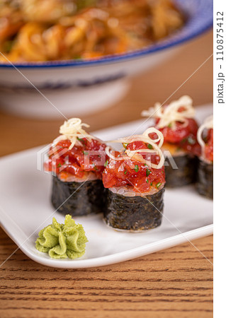 Appetizing japanese tuna sushi rolls Appetizing japanese tuna sushi rolls 110875412