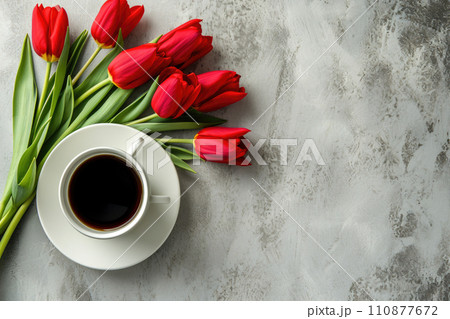 Cup of tea or coffee and tulips on concrete table top view with copy space Cup of tea or coffee and tulips on concrete table top view with copy space 110877672