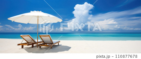 Sunbeds and umbrella on the beach, summer vacation background Sunbeds and umbrella on the beach, summer vacation background 110877678