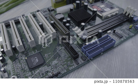 Motherboard close up. Electronic circuit board with processor, close up 110878563