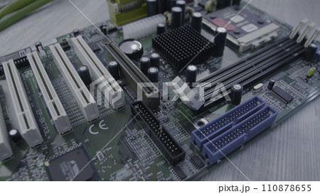 Motherboard close up. Electronic circuit board with processor, close up Motherboard close up. Electronic circuit board with processor, close up 110878655