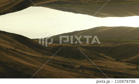 Aerial view of surreal with hills, mountains and fields against blue sky with mirror effect. Shot. Abstract reflection 110878786