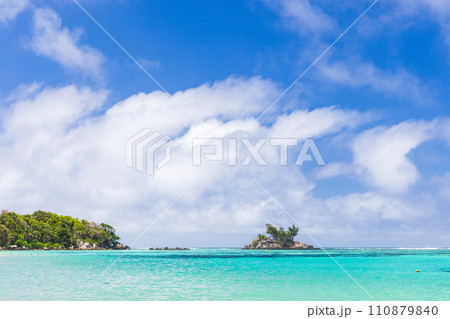 Anse Royale, Seychelles. Coastal view with small island under blue sky 110879840