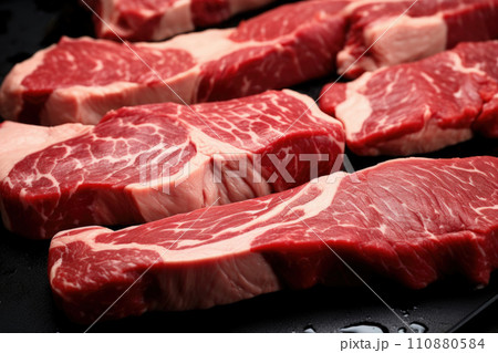 Marbled meat, top blade meat steak, on table background, with copy space for text Marbled meat, top blade meat steak, on table background, with copy space for text 110880584