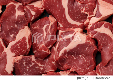 Marbled meat, top blade meat steak, on table background, with copy space for text 110880592