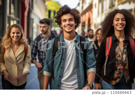 Happy multiracial friends walking down the street. Friendship concept with multicultural young people on winter clothes having fun together 110880663