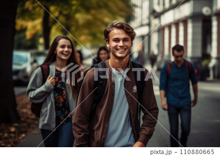 Happy multiracial friends walking down the street. Friendship concept with multicultural young people on winter clothes having fun together 110880665