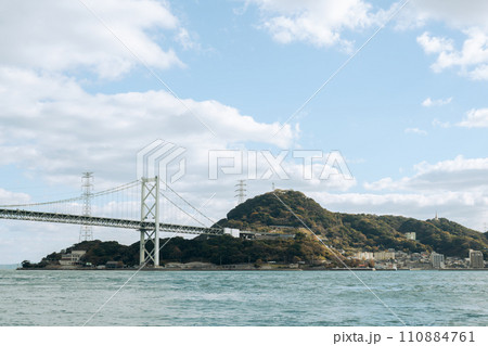 Shimonoseki Kanmon bridge and Kitakyushu Moji in Yamaguchi, Japan 110884761