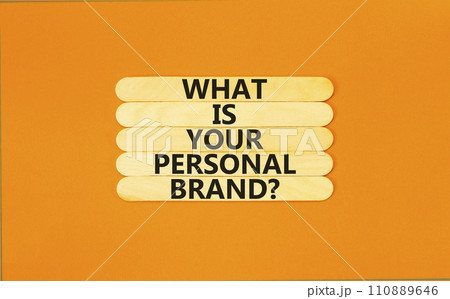 What is your personal brand symbol. Concept words What is your personal brand on wooden stick. Beautiful orange table orange background. Business, what is your personal brand concept. Copy space. What is your personal brand symbol. Concept words What is your personal brand on wooden stick. Beautiful orange table orange background. Business, what is your personal brand concept. Copy space. 110889646