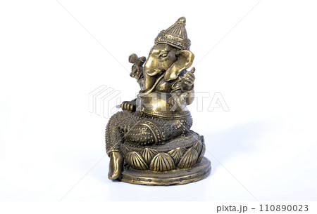 Hindu God Ganesh (Ganesha) Statuette, isolated on a white background Hindu God Ganesh (Ganesha) Statuette, isolated on a white background 110890023