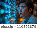 young asian man working with futuristic transparent interface 110891879