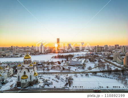 Winter Yekaterinburg and Temple on Blood in beautiful blue clear sunset. Aerial view of Yekaterinburg, Russia. Translation of the text on the temple Winter Yekaterinburg and Temple on Blood in beautiful blue clear sunset. Aerial view of Yekaterinburg, Russia. Translation of the text on the temple 110892199