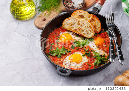 Delicious shakshuka breakfast in a pan Delicious shakshuka breakfast in a pan 110892438