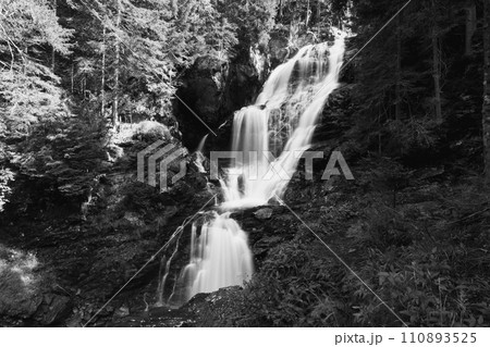 Riesach waterfall in Untertal Valley, Rohrmoos-Untertal in Schladminger Alps, Austria. Black and white photography. 110893525