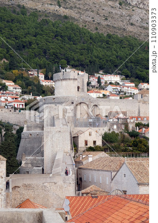 Defense walls of the old town of Dubrovnik, a well-preserved medieval fortress and a popular tourist destination, Croatia 110903373