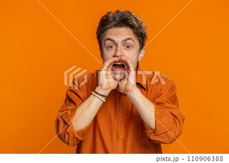 Caucasian man whisper news rumors holding hands near mouth share gossip quiet keep my secrets Caucasian man whisper news rumors holding hands near mouth share gossip quiet keep my secrets 110906388