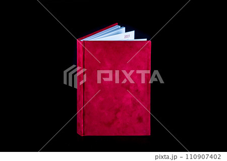 close up of a blank velour fluffy notebook on black background with clipping path 110907402