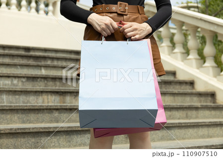 Shopping bags, on the street, on the background of steps. 110907510