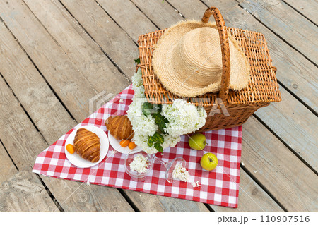 The concept of a picnic by the sea, with flowers. 110907516