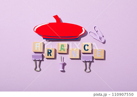 Beret with the word France on a purple background. 110907550