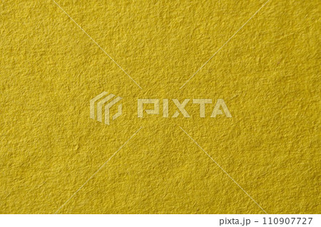 Yellow fluffy velvet texture background. Yellow velvet fabric 110907727