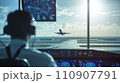 管制塔から離陸中の旅客機を監視する管制官：AI作品 110907791