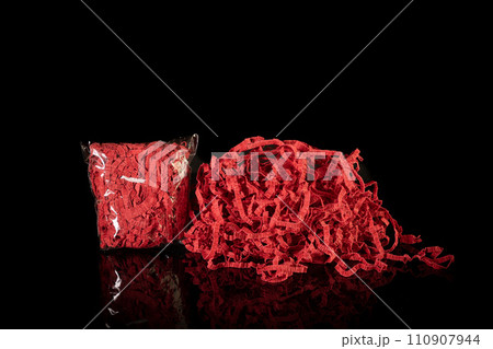 Closeup decorative Shredded color craft tissue paper black background 110907944