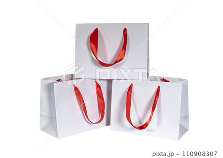 Recyclable craft paper bag for purchases, gifts and takeaway food mock up on white background. Environmentally friendly than single-use plastic bags Recyclable craft paper bag for purchases, gifts and takeaway food mock up on white background. Environmentally friendly than single-use plastic bags 110908307