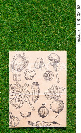 a paper bag lies on the green grass, moss, mock up a paper bag lies on the green grass, moss, mock up 110908362