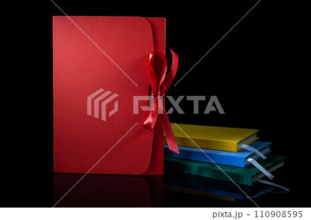 Best gift for men. Man gift concept. Various notebooks with craft gift box black background. Copy space text. Valentine's day, wedding, birthday and special occasion gift concept. Copy space for text. Best gift for men. Man gift concept. Various notebooks with craft gift box black background. Copy space text. Valentine's day, wedding, birthday and special occasion gift concept. Copy space for text. 110908595
