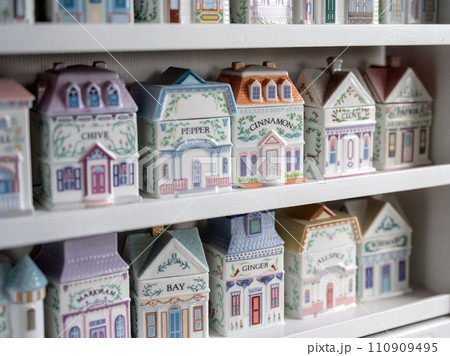 Grandmothers vintage kitchen spices shelf tools for cooking in old house formed porcelain containers Grandmothers vintage kitchen spices shelf tools for cooking in old house formed porcelain containers 110909495
