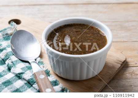 Green Chimichurri Sauce on wooden table Green Chimichurri Sauce on wooden table 110911942
