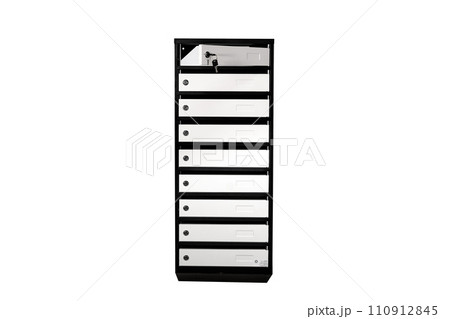 Mail boxes filled of leaflets and letters. Shallow DOF,Mailboxes and Lock in Rows at Entrance Mail boxes filled of leaflets and letters. Shallow DOF,Mailboxes and Lock in Rows at Entrance 110912845