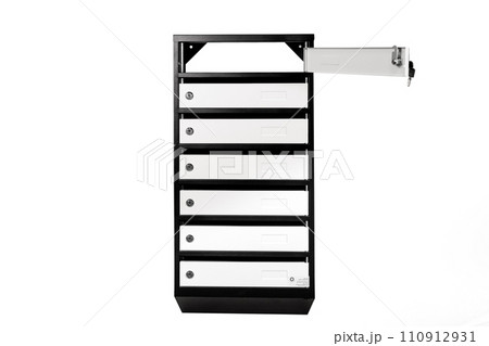Mail boxes filled of leaflets and letters. Shallow DOF,Mailboxes and Lock in Rows at Entrance Mail boxes filled of leaflets and letters. Shallow DOF,Mailboxes and Lock in Rows at Entrance 110912931