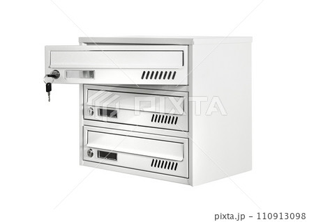 Mail boxes filled of leaflets and letters. Shallow DOF,Mailboxes and Lock in Rows at Entrance 110913098