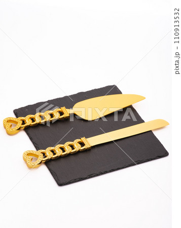 Tasty heart shaped pizza and spatula on blue background 110913532