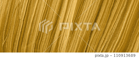 Abstract fluid art background golden glitter colors. Liquid marble. Acrylic painting with dark yellow gradient. Abstract fluid art background golden glitter colors. Liquid marble. Acrylic painting with dark yellow gradient. 110913689